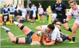  ?? Photograph: Hannah Peters/World Rugby/Getty Images ?? Amy Cokayne of England scores a try during the victory over Australia.