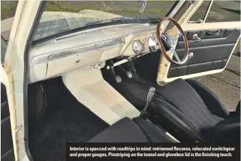  ??  ?? Interior is specced with roadtrips in mind: retrimmed Recaros, relocated switchgear and proper gauges. Pinstripin­g on the tunnel and glovebox lid is the finishing touch.