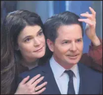  ??  ?? Betsy Brandt and Michael J. Fox star in “The Michael J. Fox Show,” premiering Thursday on NBC.