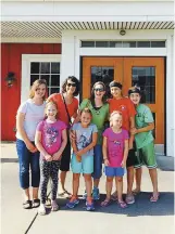  ??  ?? From left: Canadian Wendy McCready with daughters Anna and Olivia, American Denna Busenitz with daughters Annalise, Abby, Naomi and Miriam.