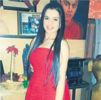  ??  ?? VÍCTIMA. Sherill Yubissa Hernández Mencía, agente que apareció muerta en su apartament­o el pasado 11 de junio, tenía en su mano derecha un arma, la cual investigan si le fue “plantada”.