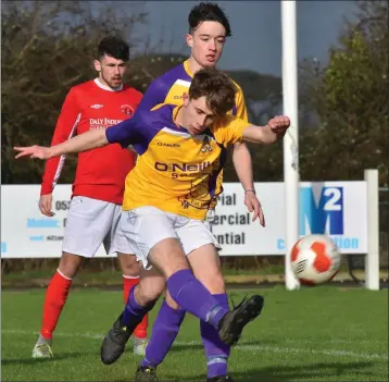  ??  ?? Dion Murphy of the Wexford Football League clears the danger against the Cork Youth League.