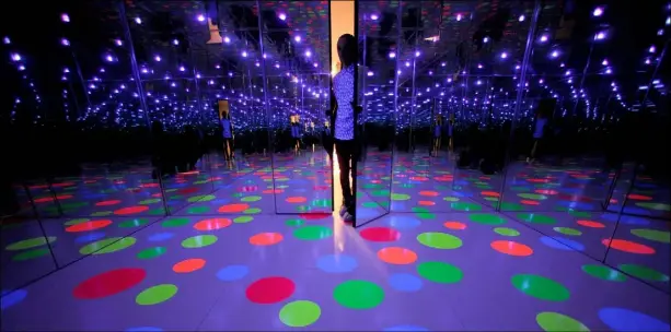  ?? Michael Henninger/Post-Gazette ?? Until its recent troubles, the Mattress Factory was known for contempora­ry art installati­ons such as "Infinity Dots Mirrored Room" by artist Yayoi Kusama.