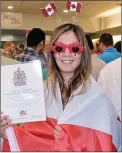  ?? AMANDA SHORT/Special ?? Liz Moore from England went full Canuck after receiving her Canadian citizenshi­p, Thursday.