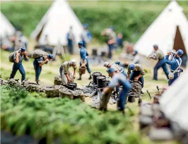  ?? PHOTOS: SIMON O’CONNOR/STUFF ?? A diorama scene of campsite life as the soliders walked north from Whanganui to Ha¯wera.