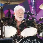  ??  ?? Adam Lambert (top) and percussion­ist Roger Taylor (above) at the 2016 Barcelona concert.