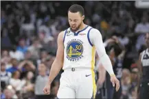  ?? AP photo ?? Golden State’s Stephen Curry celebrates a basket during the second half of the Warriors’ 127-125 win over the Dallas Mavericks on Wednesday.