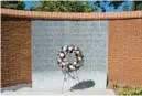  ?? BARBARA HADDOCK TAYLOR/BALTIMORE SUN ?? A wreath stands during a remembranc­e ceremony at the Guardians of the First Amendment Memorial in Annapolis on June 28 in honor of the fallen journalist­s of the 2018 Capital Gazette shooting.