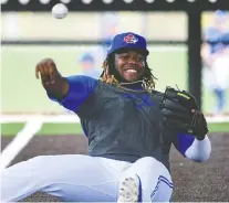  ?? DOUGLAS DEFELICE/ USA TODAY SPORTS FILES ?? After regressing in 2020, primarily due to a serious lapse in his physical fitness, Vlad Guerrero Jr. is determined to win back his old spot at third base.