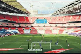 ??  ?? Empty seats: Wembley Stadium at last year’s FA Cup final between Arsenal and Chelsea