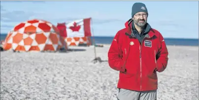  ?? THE CANADIAN PRESS PHOTOS/JASON FRANSON ?? Park Canada’s Chief Underwater Archeologi­st Marc-Andre Bernier is shown at Davit camp on Saunitalik Island near Gjoa Haven Nunavut. Bernier is part of a crew working to recover artifacts left on the sunken Franklin ships the Erebus and Terror.