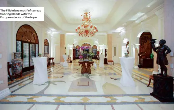  ??  ?? The Filipinian­a motif of terrazo flooring blends with the European decor of the foyer.