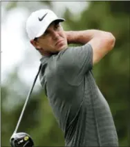  ?? CHUCK BURTON — THE ASSOCIATED PRESS ?? Brooks Koepka watches his tee shot on the third hole during the third round of the PGA Championsh­ip golf tournament at the Quail Hollow Club, in Charlotte, N.C. The Ryder Cup and the Presidents Cup are not on the same level when it comes to history or...