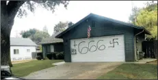  ?? COURTESY FILE PHOTOGRAPH ?? Several homes in Woodbridge were tagged with hate symbols in November 2017.