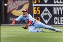  ?? LAURENCE KESTERSON — THE ASSOCIATED PRESS ?? St. Louis Cardinals right fielder Lars Nootbaar dives for a single by the Phillies’ Alec Bohm during the third inning Saturday at Citizens Bank Park.