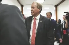  ?? YI-CHIN LEE/AP ?? TEXAS ATTORNEY GENERAL KEN PAXTON appears at a pretrial hearing in his securities fraud case before state District Judge Andrea Beall on Tuesday at Harris County Criminal Courts at
Law in Houston.