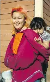  ?? JACKIE DIVES ?? A mom and her baby in RESOLUTE BAY, Nunavut, the second-most northern community in Canada, and the most northern community the Canada C3 ship visited, on leg 9 of the expedition, Aug. 17.