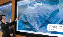  ?? Yonhap ?? A Korea Meteorolog­ical Administra­tion (KMA) official brief an artificial earthquake detected at North Korea’s nuclear test site in Punggye-ri, Sept. 3. The explosion was many times larger than that of the fourth and fifth tests, triggering concerns of...