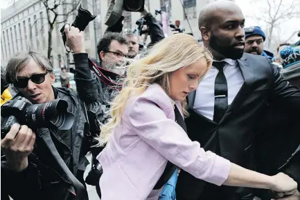  ?? — AP ?? Porn actress Stormy Daniels arrives at Federal Court for a hearing where a federal judge considered what to do with materials the FBI seized from U.S. President Donald Trump’s personal lawyer.