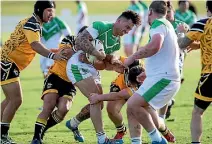  ?? PHOTO: MURRAY WILSON/FAIRFAX NZ ?? Manawatu Mustangs lock Codie Christense­n, centre, was in great form against the Taranaki Sharks at Fitzherber­t Park on Saturday.