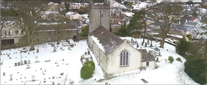  ?? Picture Ken Finegan/Newspics ?? A file photograph of the Holy Trinity Heritage Centre, Carlingfor­d in snowy weather during 2019.