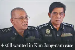  ?? ZHANG WENZONG / XINHUA ?? Noor Rashid Ibrahim, Malaysia’s deputy national polic chief (left), speaks at a news conference in Kuala Lumpur on Sunday regarding the Kim Jong-nam case.