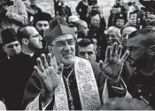  ?? NASSER NASSER/AP ?? Christians celebrate the arrival of Archbishop Pierbattis­ta Pizzaballa.