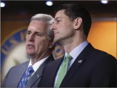  ??  ?? House Majority Leader Kevin McCarthy, R-Calif., and Speaker of the House Paul Ryan, R-Wis., confer during a news conference following a closed-door GOP meeting on immigratio­n, on Capitol Hill in Washington, Wednesday. AP PHOTO/J. SCOTT APPLEWHITE