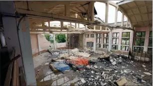  ?? The Associated Press ?? General view of the ruins of the sports complex of the National Technical University in Kharkiv, Ukraine, damaged during a night shelling.