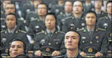  ?? LARRY DOWNING / NEW YORK TIMES ?? Cadets listen to U.S. Secretary of Defense Leon Panetta speak at the Armored Forces Engineerin­g Academy in Beijing on Wednesday.