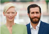  ?? — AFP ?? Actors Tilda Swinton and Jake Gyllenhaal during a photocall for Okja’ in Cannes, France, on Friday.