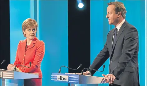  ?? Picture: Getty Images. ?? Nicola Sturgeon and David Cameron during last week’s TV debate. She denies saying she would prefer him as Prime Minister rather than Labour leader Ed Miliband.