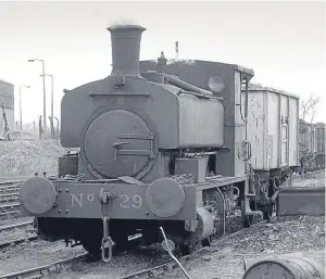  ?? Pictures: Rick Booth ?? Above: A National Coal Board No 29 locomotive. Left: Shed47 volunteers, from left, Pete Westwater, Grant Robertson, Mark Bradshaw, Norman Briggs, David Coupar and Jim Paterson.