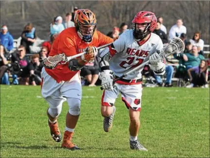  ?? AUSTIN HERTZOG - DIGITAL FIRST MEDIA ?? Boyertown’s Jonathan Mayan (27) is pressured by Perkiomen Valley’s Zion Foster during Thursday’s game.