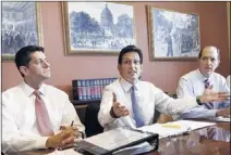  ??  ?? House Majority Leader Eric Cantor, R-Va. (center) is flanked by Reps. Paul Ryan (left) and Dave Camp at a meeting Tuesday with House GOP conferees.