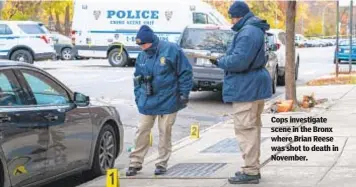  ?? ?? Cops investigat­e scene in the Bronx where Brian Reese was shot to death in November.