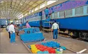  ??  ?? Railway technician­s modify a train coach into an isolation ward for the treatment of Covid-19 affected patients in Patna on Sunday