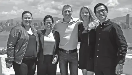  ??  ?? HELPING THE DISABLED. Reiza Dejito, Humanity & Inclusion Regional Programme Director (second from left) and Tim Oliver, FWD Group Chief Commercial Officer (center), along with representa­tives from FWD Indonesia and Philippine­s pose for a photograph...