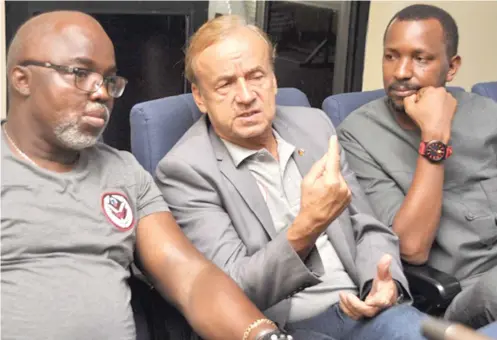  ??  ?? From left: NFF President, Amaju Pinnick, Super Eagles coach, Gernot Rohr and League Management Company chairman, Shehu Dikko discussing football related matters