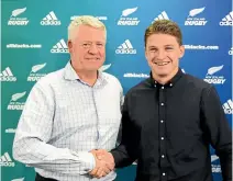  ?? PHOTO: GETTY IMAGES ?? Steve Tew with Beauden Barrett after Barrett signed with NZ Rugby for three years.