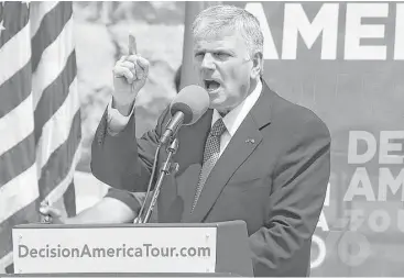  ??  ?? Franklin Graham makes a point at a prayer rally attended by Gov. Greg Abbott and Lt. Gov. Dan Patrick in April. Graham, the son of Billy Graham, doesn’t identify with a specific denominati­on.