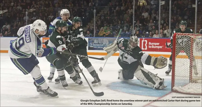  ?? SCOTT ANDERSON/SOUTHWEST BOOSTER ?? Giorgio Estephan (left) fired home the overtime winner past an outstretch­ed Carter Hart during game two of the WHL Championsh­ip Series on Saturday.