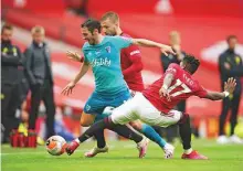  ?? Reuters ?? ■
United’s Fred (right) battles for the ball with Bournemout­h’s Adam Smith in a Premier League match yesterday.