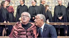  ??  ?? Jean Claude Juncker, European Commission president, left, with Portugal’s president, Marcelo Rebelo de Sousa, is given an honorary degree at Coimbra University yesterday