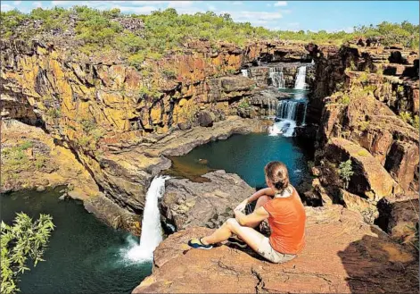  ?? MICHAELA URBAN/PHOTOS FOR THE CHICAGO TRIBUNE ?? A visit to the towering cascades at Mitchell Falls, 150 miles off the Gibb River Road, is a rite of passage for many Australian­s.