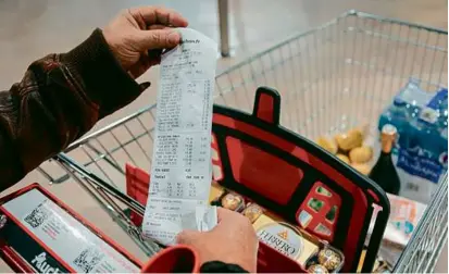  ?? CYRIL MARCILHACY/BLOOMBERG ?? A typical basket of food basics in France still costs 7 percent more than it did a year ago. France’s biggest retailer has dropped PepsiCo products, citing their high prices.