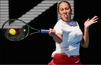  ?? Simon Baker / Associated Press ?? Madison Keys of the U.S. plays a forehand return to Paula Badosa of Spain during their fourth round match at the Australian Open. Keys won 6-3, 6-1.