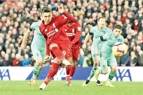  ??  ?? Roberto Firmino scored a hat-trick as Liverpool beat Arsenal 5-1 in December. - AFP photo