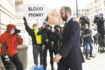 ?? Susan Walsh / Associated Press ?? Rick Gates, a former top adviser to President Trump’s campaign, arrives at the federal courthouse in Washington to plead guilty to conspiracy and false-statements charges.