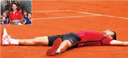  ?? (Reuters) ?? NOVAK DJOKOVIC (and inset) lies on the clay at Roland Garros following his conquest of Andy Murray in Sunday’s French Open final.